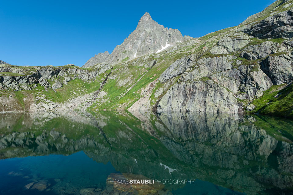 Spiegelung am Obersee mit Sunnig im Hintergrund