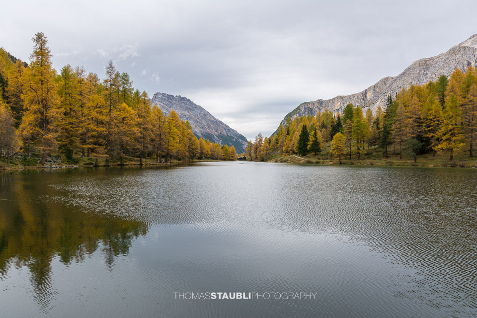 bewölkter Himmel über dem Palpuognasee