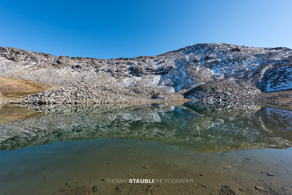 Spiegelung im Schwärziseeli bei den Stotzigen Firsten